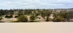 View of camp ground from top of sand dune at Snow Drift Picnic Area