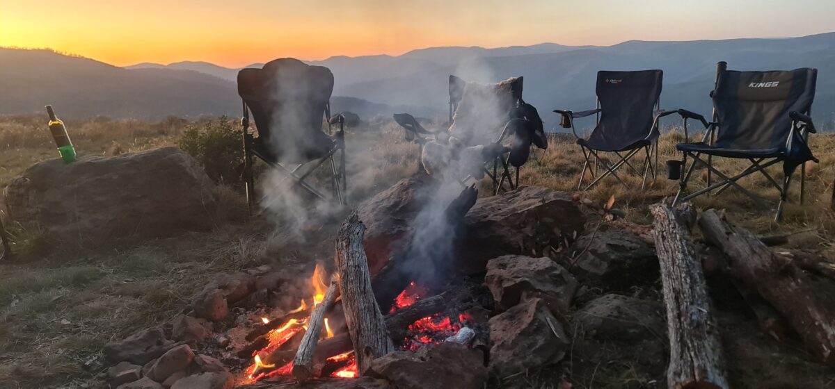 May be an image of campsite and fire